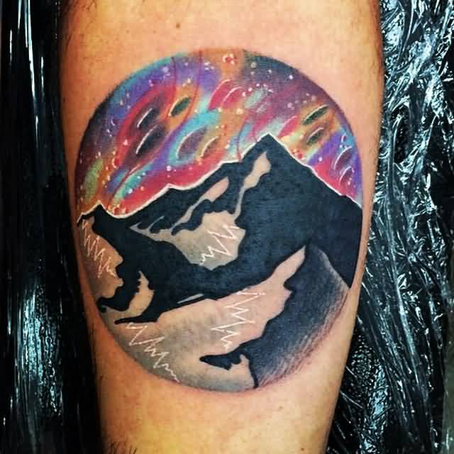 Beautiful Colorful Mountains In Circle Tattoo On Forearm