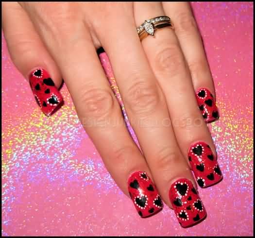 Beautiful Red Nails With Black Hearts Design Nail Art
