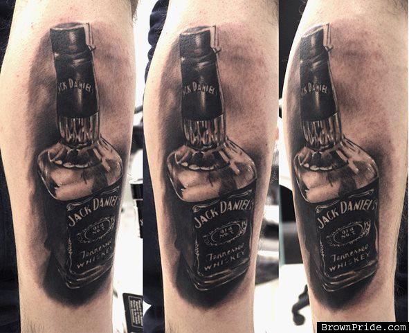 Black And Grey Color Jack Daniel Bottle Tattoo
