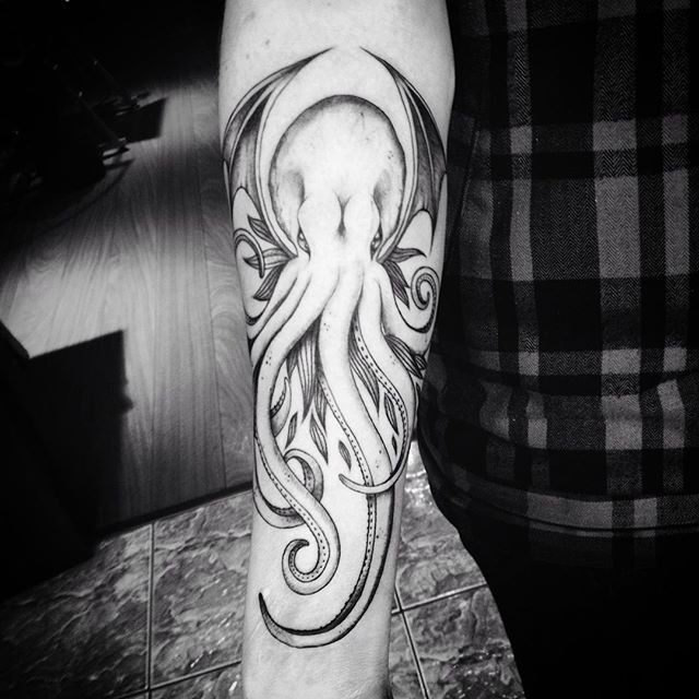 Black And Grey Cthulhu Tattoo On Right Forearm
