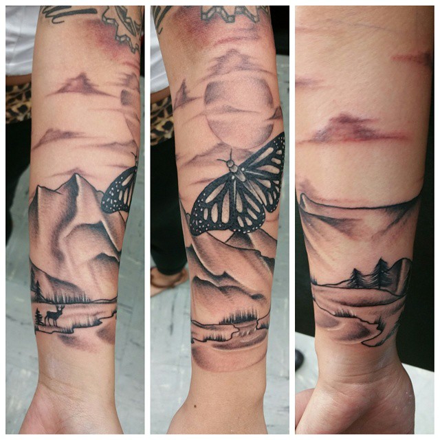 Black And Grey Mountains And Butterfly With Trees Tattoo On Arm Sleeve