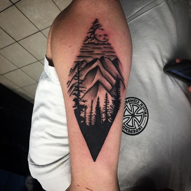 Black And Grey Mountains With Trees In Diamond Shape Tattoo On Arm Sleeve