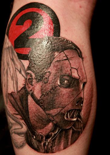 Black And Grey Slipknot Member Face Tattoo