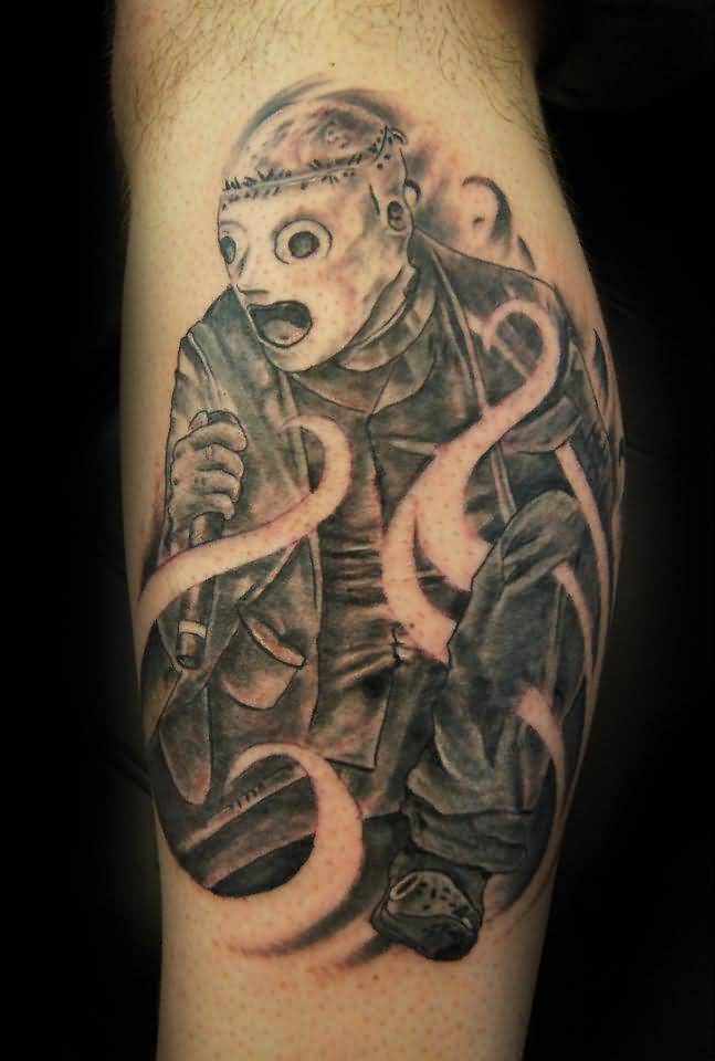 Black And Grey Slipknot Member Ripped Skin Tattoo