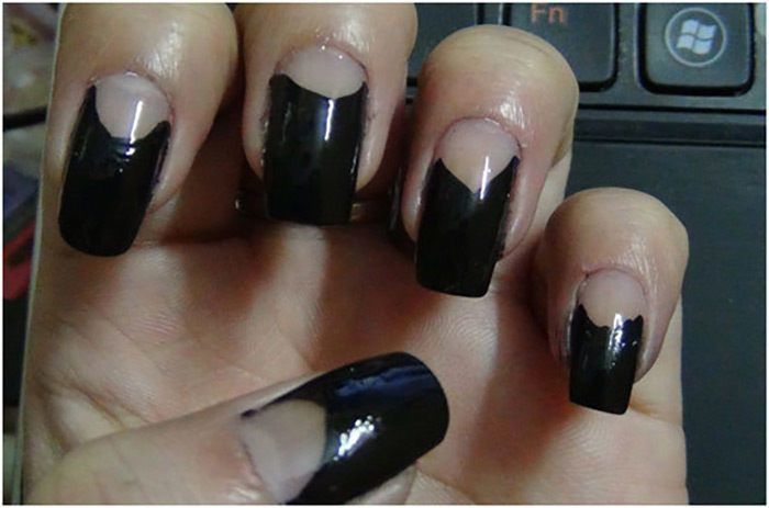 Black And Nude Chevron Design Reverse French Tip Nail Art
