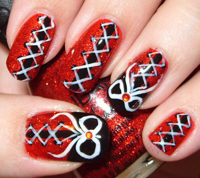 Black And Red Corset Nail Art With White Bow Design Idea