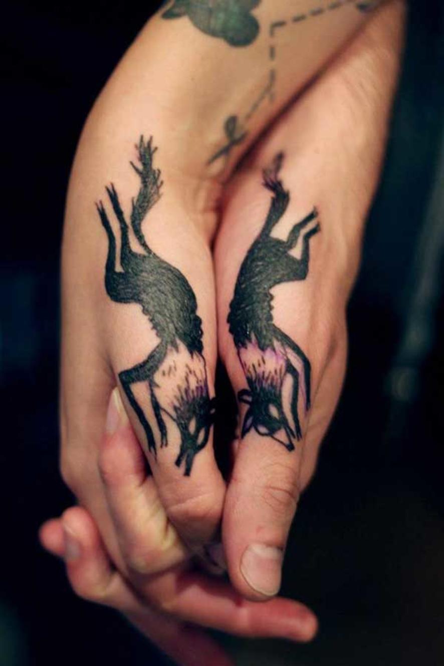 Black Color Fox Running Matching Tattoos On Thumbs