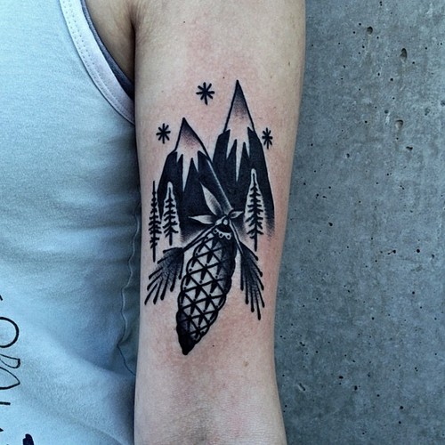 Black Color Mountains And Stars Tattoo On Bicep