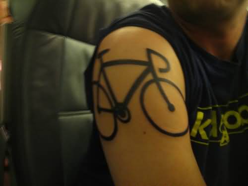 Black Cycle Outline Tattoo On Right Shoulder