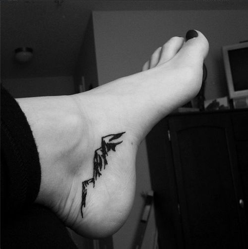 Black Ink Mountains Tattoo On Foot