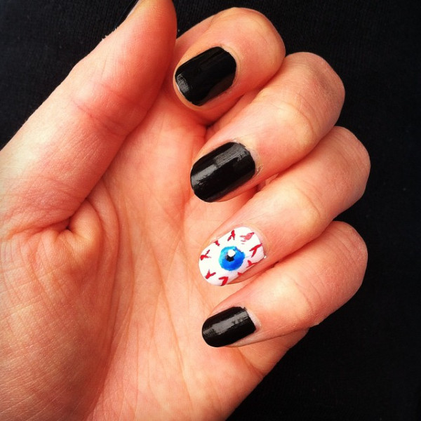 Black Nails With Accent Scary Eye Halloween Nail Art
