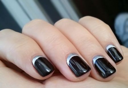 Black Nails With Silver Reverse French Tip Nail Art