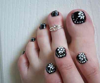 Black Nails With White Dots And Flowers Design Nail Art