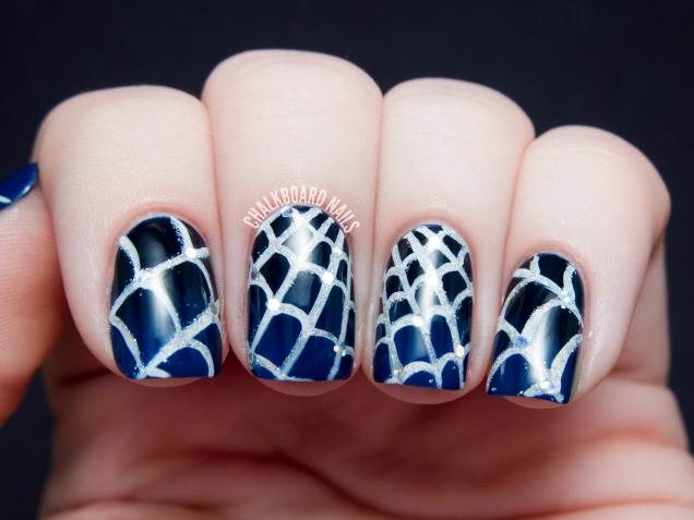 Blue And Black Ombre Nails With White Spider Web Halloween Nail Art