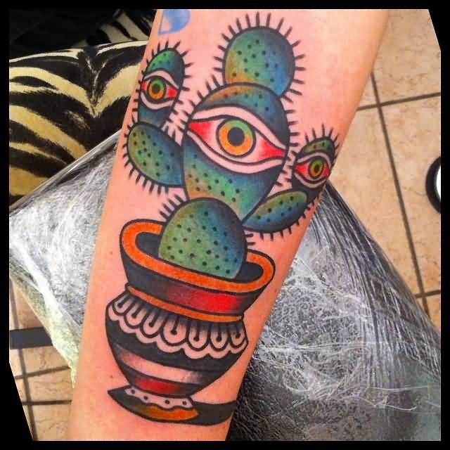 Cactus With Eyes Traditional Tattoo On Forearm
