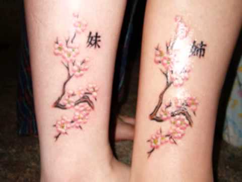 Cherry Blossom Tree Branches Matching Tattoos On Legs