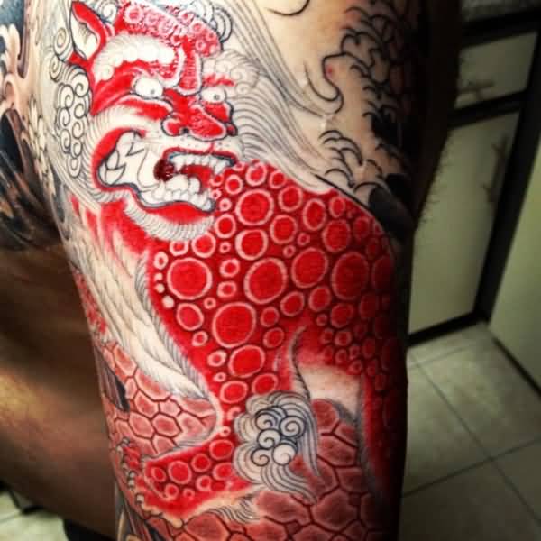 Chinese Red Color Foo Dog Tattoo On Half Sleeve