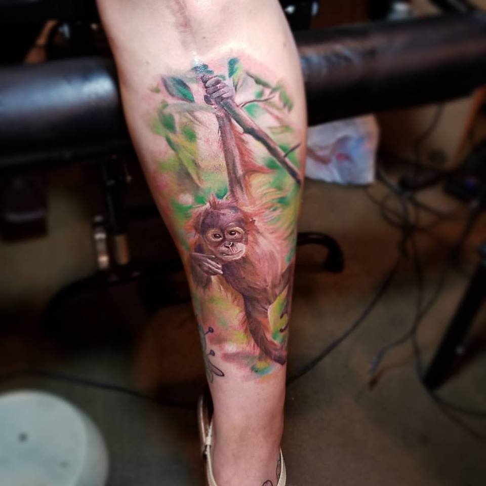 Colored Monkey Tattoo On Back Leg by Char Mcgaughy