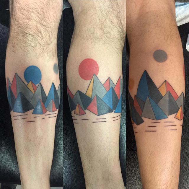 Colorful Geometric Mountains With Circle Tattoo On Forearm