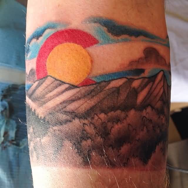 Colorful Mountains With Yellow Sun Tattoo By Bob Lackner