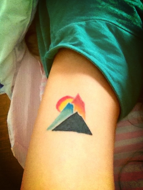 Colorful Pyramid Mountains With Rising Sun Tattoo On Bicep
