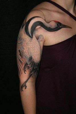 Crane Tattoo On Girl Right Half Sleeve