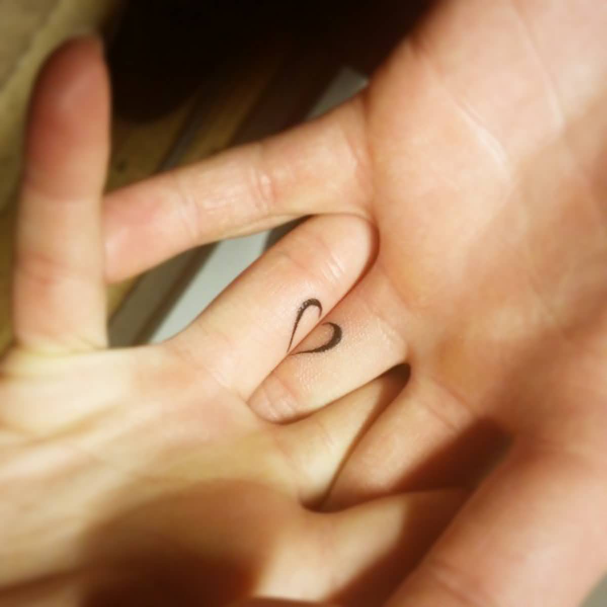 Creative Heart Outline Matching Couple Tattoos On Fingers