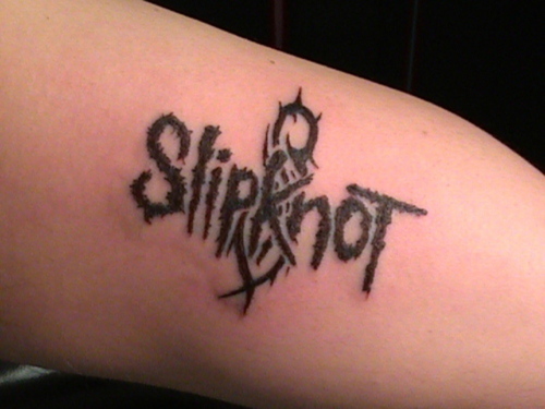Creative Slipknot Word With Logo In Background Tattoo