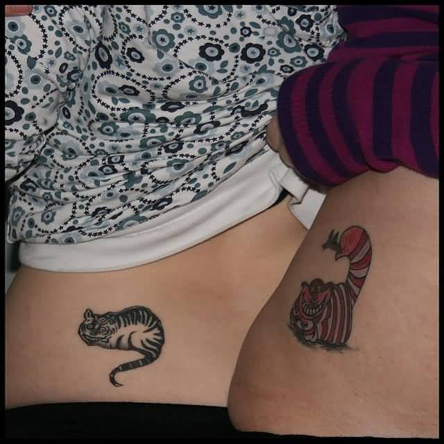 Cute And Small Smiling Cats Matching Tattoos On Lower Backs