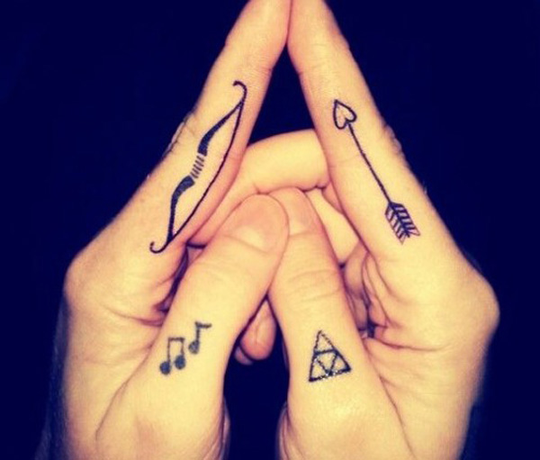Cute Arrow With Bow Matching Tattoos On Fingers