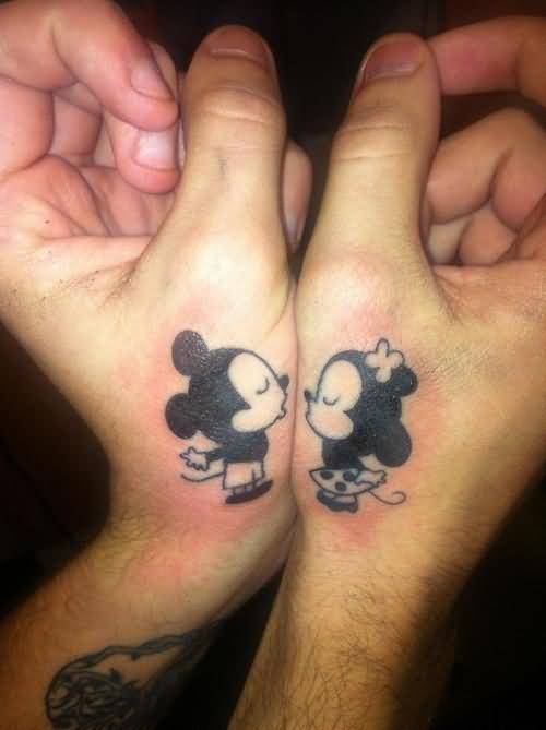 Cute Micky And Minnie kissing Matching Tattoos On Hands
