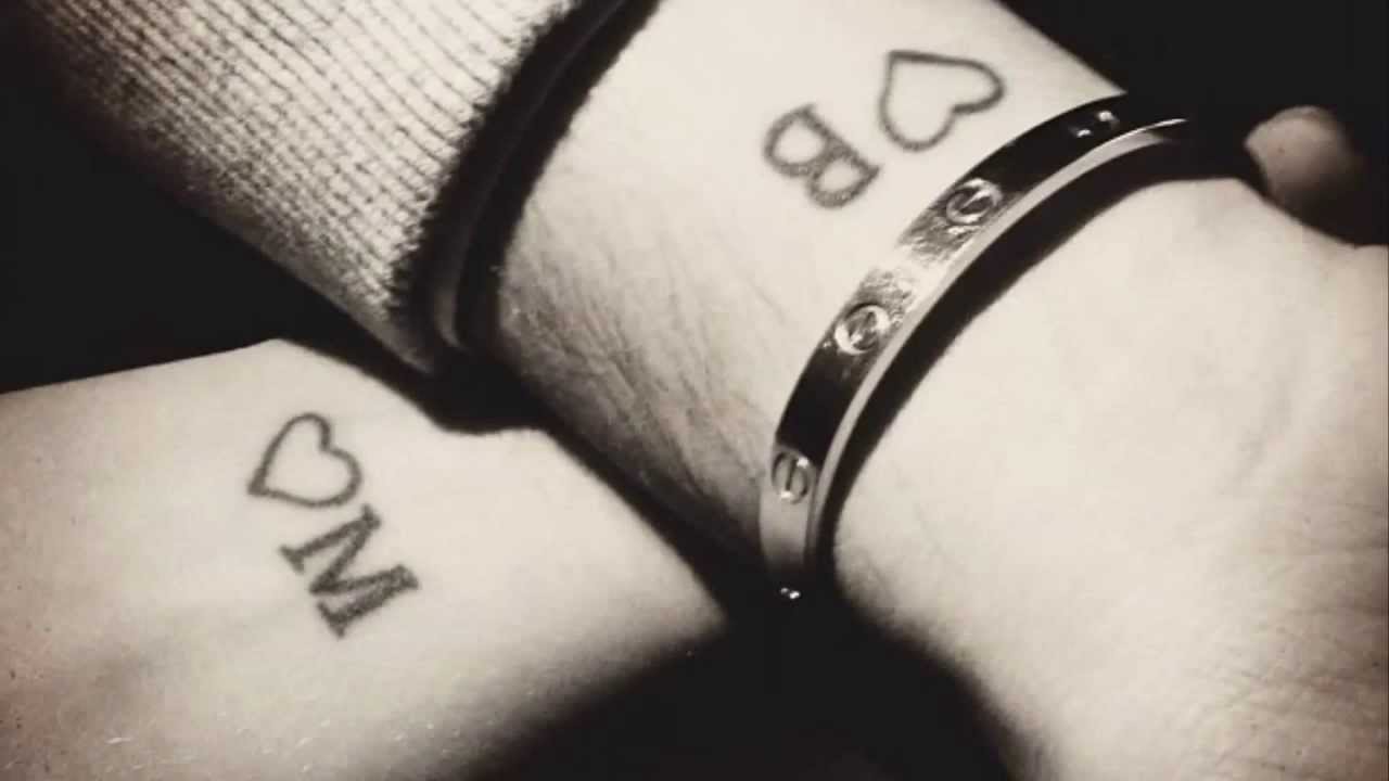 Cute Small Heart With Letter B And M Matching Tattoo On Wrist