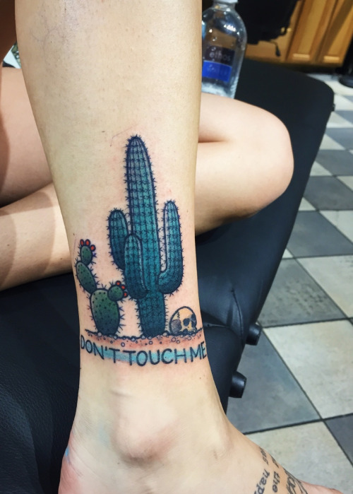 Dark Green Color Saguaro Cactus With Skull Tattoo On Leg