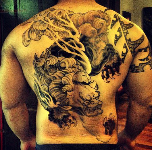 Extremely Angry Foo Dog Tattoo On Full Back