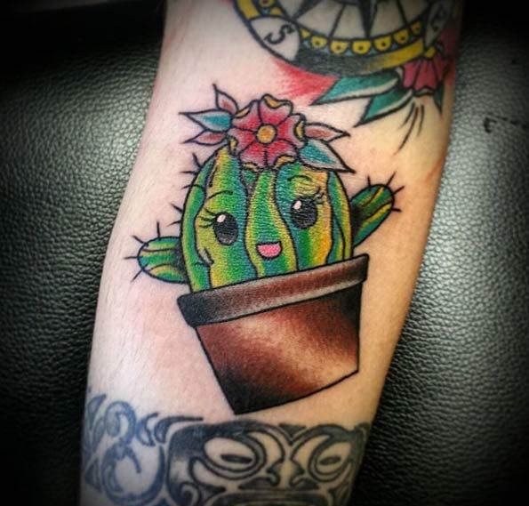 Extremely Cute Cactus With Flower In Pot Tattoo
