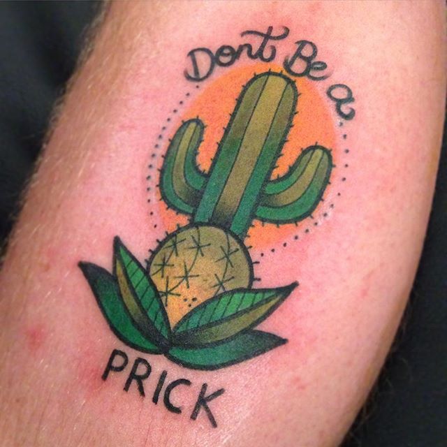 Extremely Nice Cactus With Orange Sun And Lettering Tattoo
