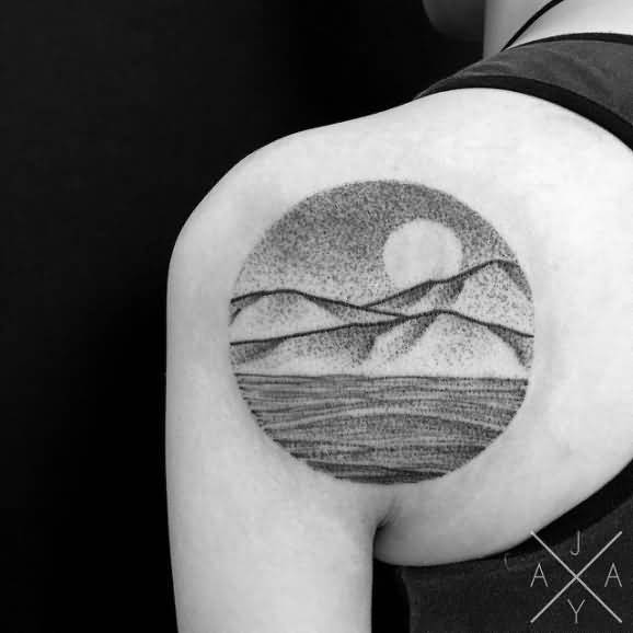 Extremely Nice Mountains And Sun In Circle Dotwork Tattoo On Left Shoulder