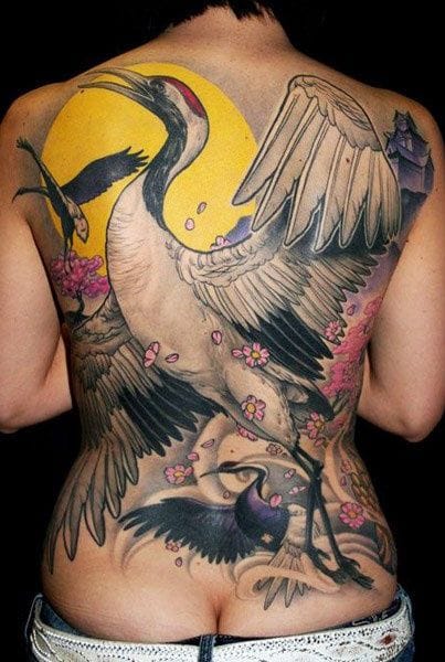 Flowers And Crane Tattoo On Full Back