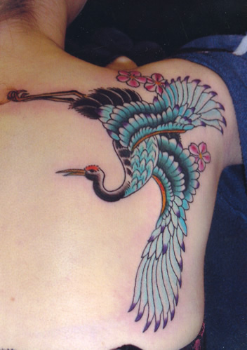 Flowers And Crane Tattoo On Right Back Shoulder