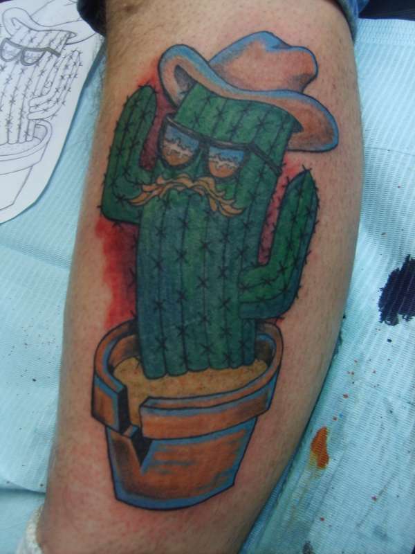 Funny Cactus Having Mustache Wearing Hat And Googles Tattoo On Leg