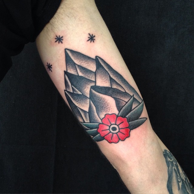 Geometric Mountains Traditional Tattoo On Bicep