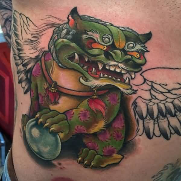 Green Color Foo Dog With Colorless Angel Wings Tattoo
