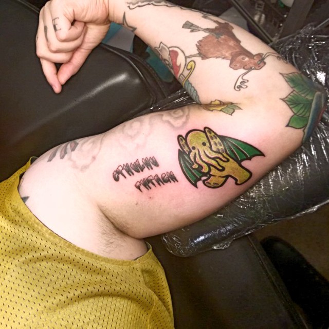 Green Devil Cthulhu Tattoo On Inner Bicep