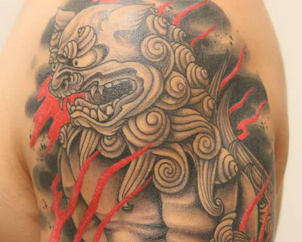 Grey Color Chinese Foo Dog Tattoo On Left Shoulder