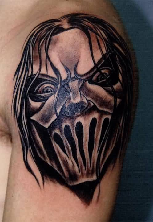Grey Color Slipknot Member Mask Tattoo On Left Shoulder