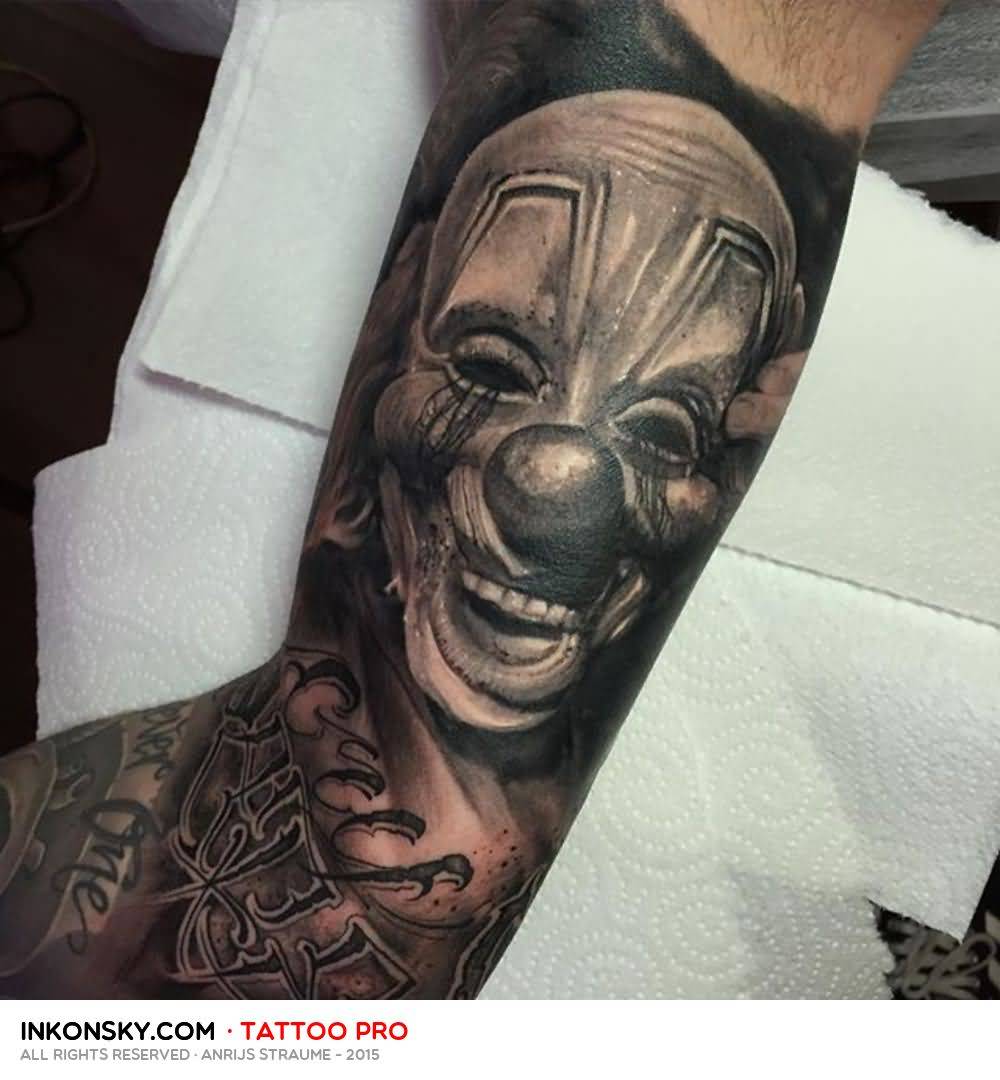 Grey Color Slipknot Member Mask Tattoo On Sleeve