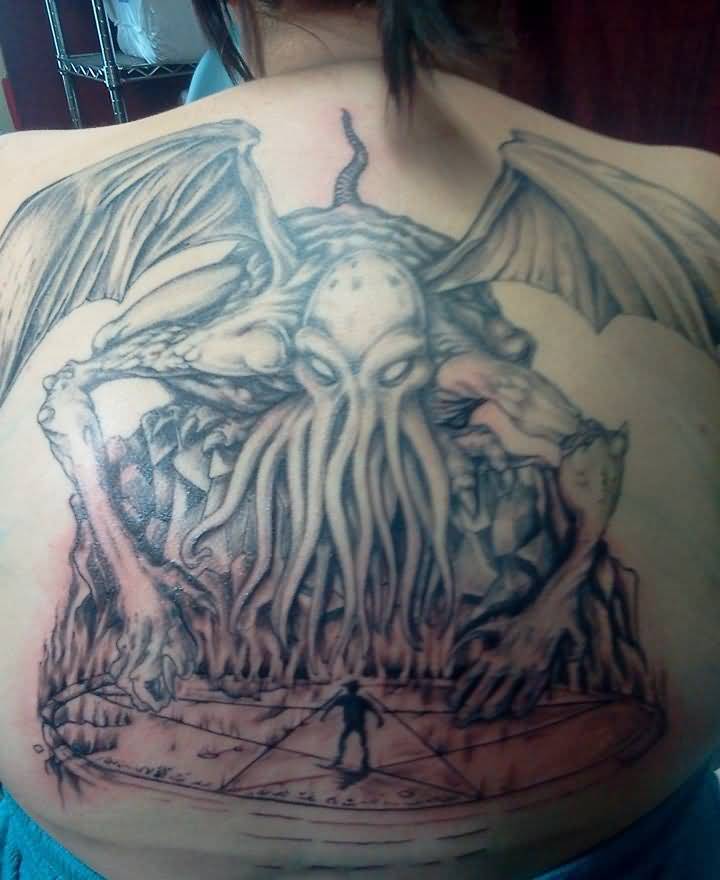 Grey Ink Cthulhu Tattoo On Back by Effieboneata