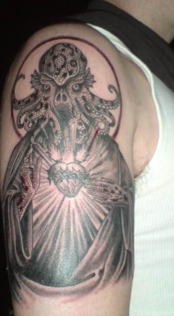 Grey Ink Cthulhu Tattoo On Man Half Sleeve