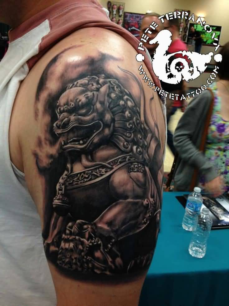 Grey Ink Foo Dog Tattoo On Left Shoulder