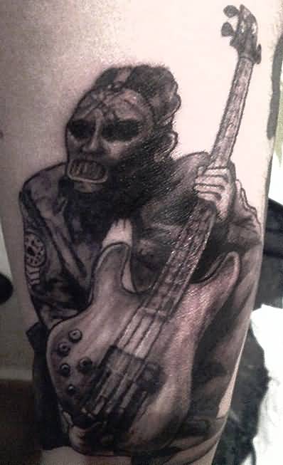 Grey Slipknot Member Having Guitar Tattoo By RavenMedia